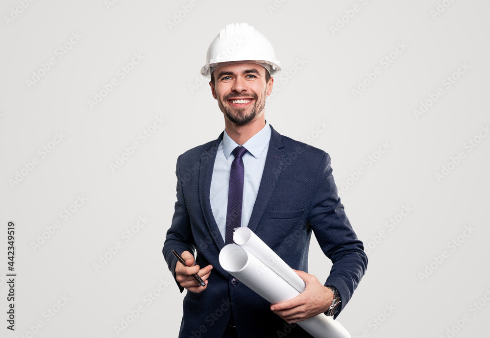 Positive architect with drafts and pen Positive architect with drafts and pen