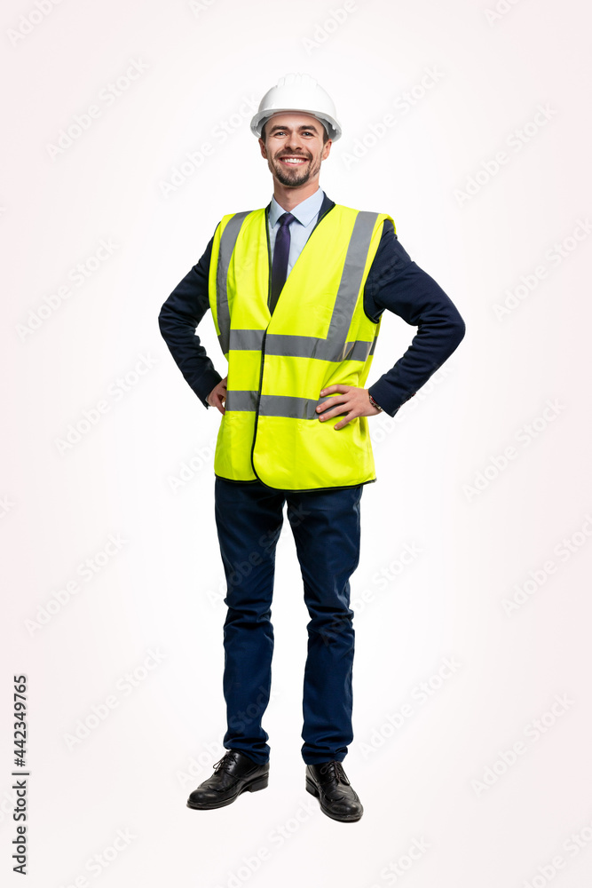 Cheerful engineer in waistcoat and hardhat Cheerful engineer in waistcoat and hardhat