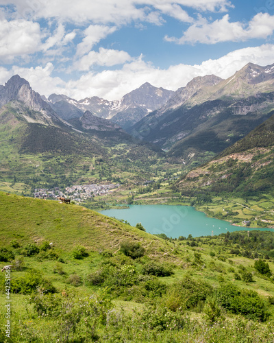 View of Sallent de G  llego and the turquoise Lanuza Reservoir on the G  llego River in the Tena Valley of the Spanish Pyrenees  Huesca  Aragon