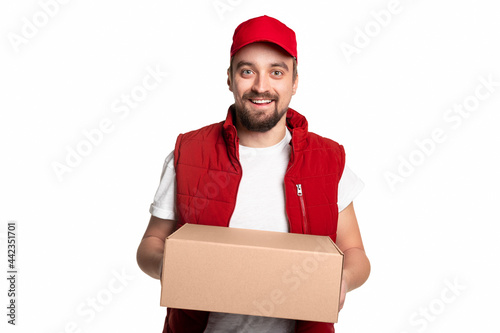 Positive male courier delivering parcel © kegfire