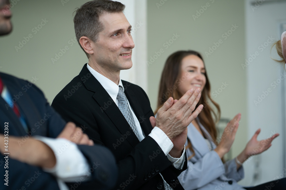 group of business people workshop training in business event at seminar room. business people applauding group of business people workshop training in business event at seminar room. business people applauding