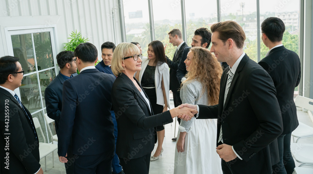 group of business people workshop training in business event at seminar room. business people shaking hands group of business people workshop training in business event at seminar room. business people shaking hands