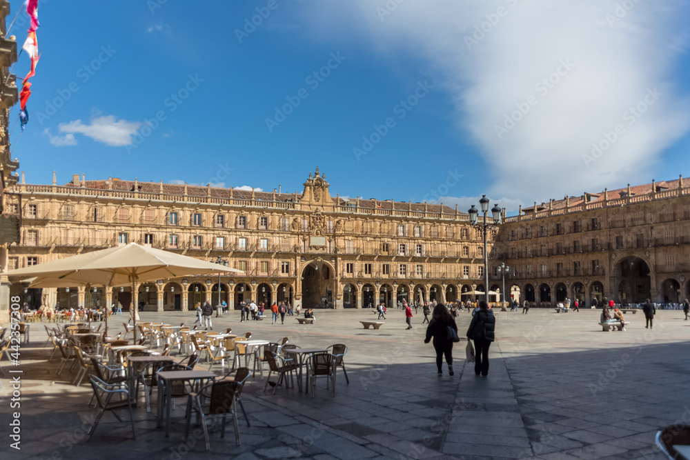 View at the baroque public plaza, 18th century, Plaza Mayor in Salamanca downtown city, tourist people visiting
