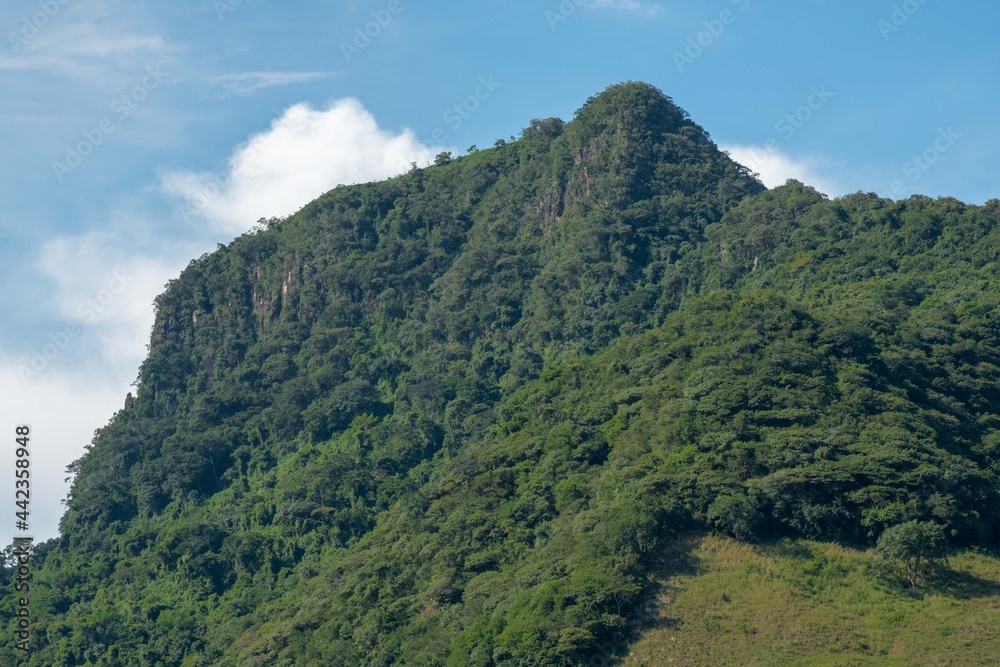 Rural landscape with mountains and blue sky in southwest Antioquia, Colombia.