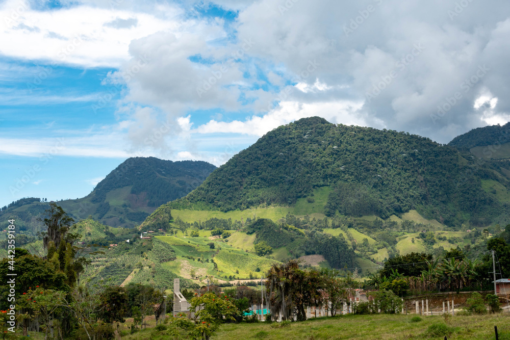 Panoramic and rural landscape with blue sky in Jardin, Antioquia, Colombia.