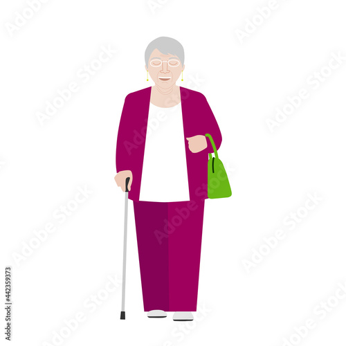 Senior woman walking with cane and bag. Stylish old lady in in pink suit. Modern elegant grandmother. 