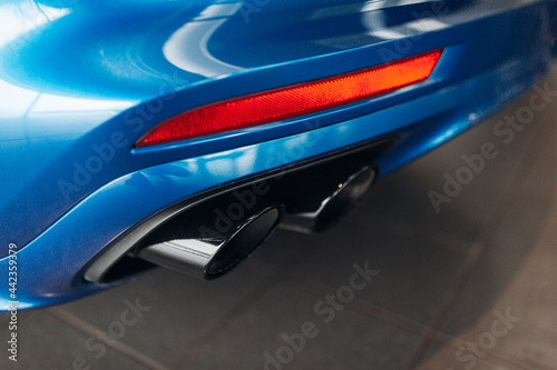 Modern and luxury sports car exhaust system pipes