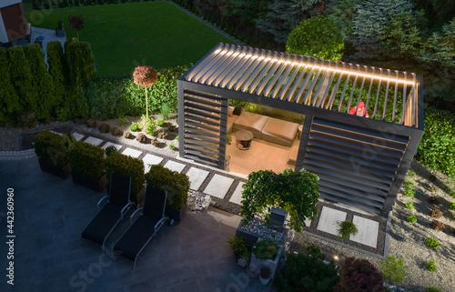 Fotobehang Illuminated Garden Gazebos with Mechanical Wall Blinds Aerial