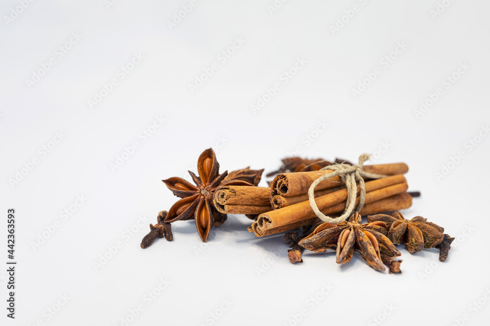 background with the image of cinnamon and anise isolated on a white background. spices. place for text on a white background