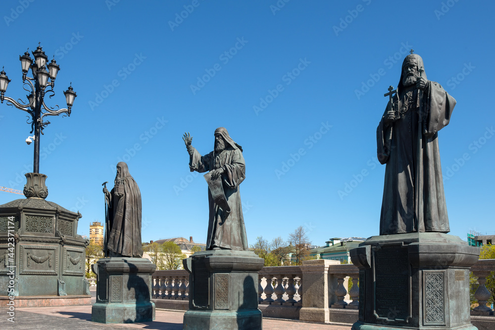 Monument to three Russian patriarchs on the terrace near the Church of the Resurrection of Christ in Moscow
