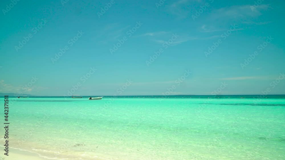 Beautiful sandy beach and turquoise water in Panglao island, Bohol, Philippines. Beautiful sandy beach and turquoise water in Panglao island, Bohol, Philippines.