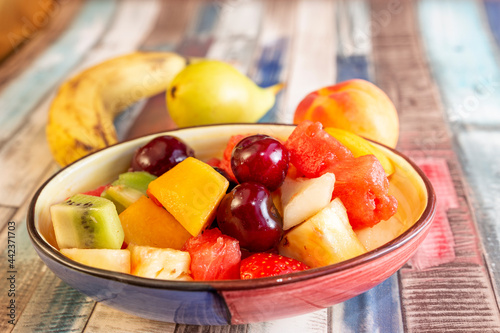 refreshing mixed summer fruit salad. seasonal fruit.