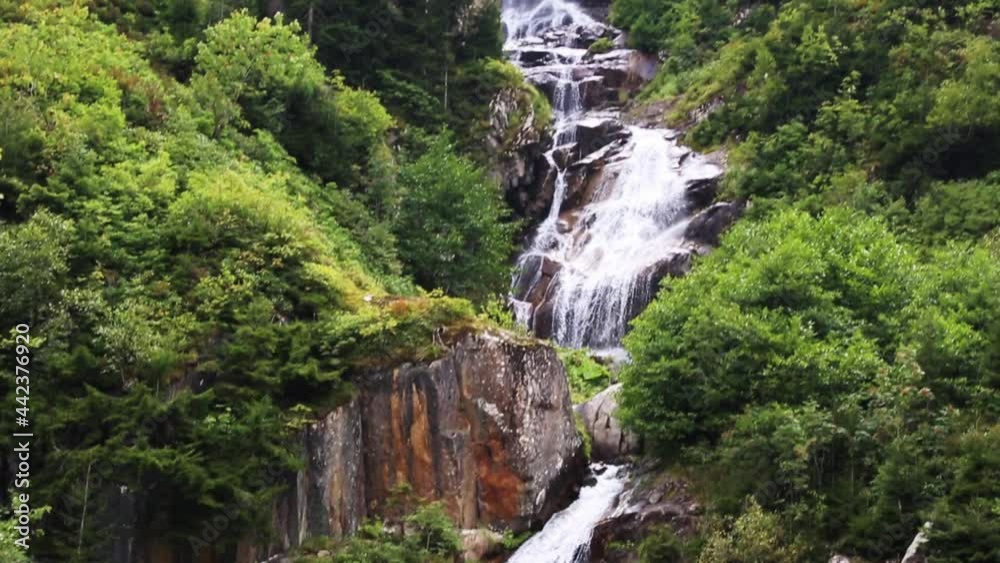The great scenery of waterfall and mountains which has a green landscape. This waterfall located in Turkey and waits for it's visitor during all seasons. The great scenery of waterfall and mountains which has a green landscape. This waterfall located in Turkey and waits for it's visitor during all seasons.