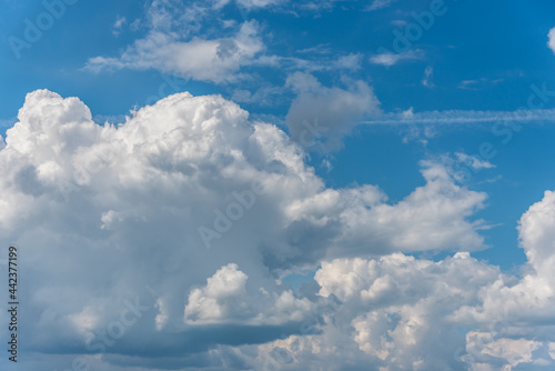 White Clouds in a Blue Sky on a Summer Day