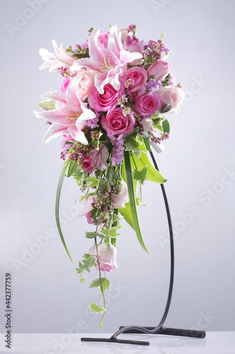A bouquet of round roses dangling