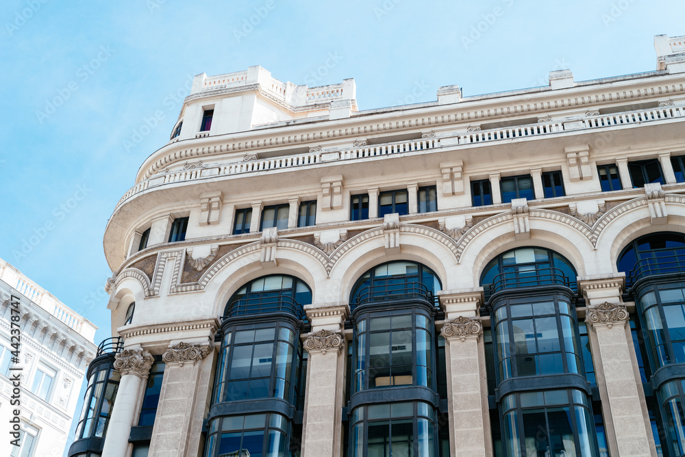 Historic buildings in Gran Via, the iconic avenue of Madrid famous for his cinemas and stores