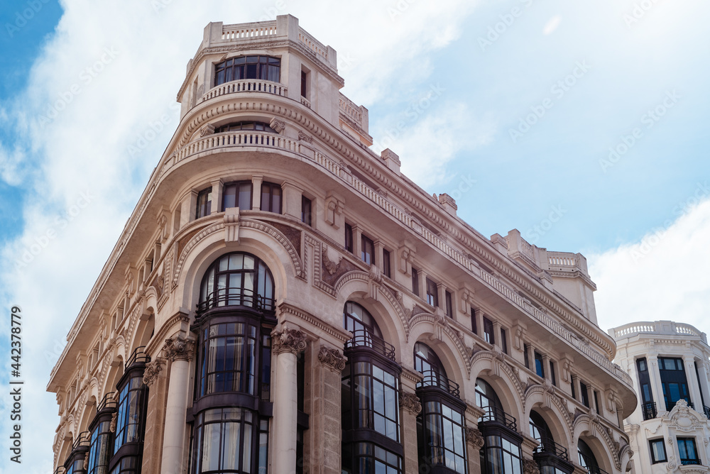Historic buildings in Gran Via, the iconic avenue of Madrid famous for his cinemas and stores