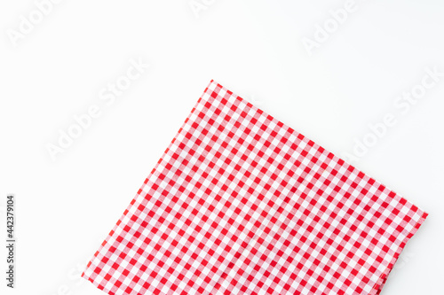 Top view tablecloth texture. Abstract fabric checkered red and white, isolated on a white background with copy space.