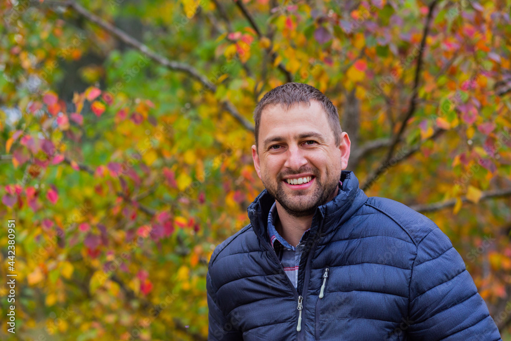 Portrait of happy Aussie man on cold autumn day outside Portrait of happy Aussie man on cold autumn day outside
