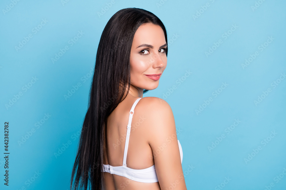 Profile photo of cheerful brown long hairdo lady wear bra isolated on blue color background