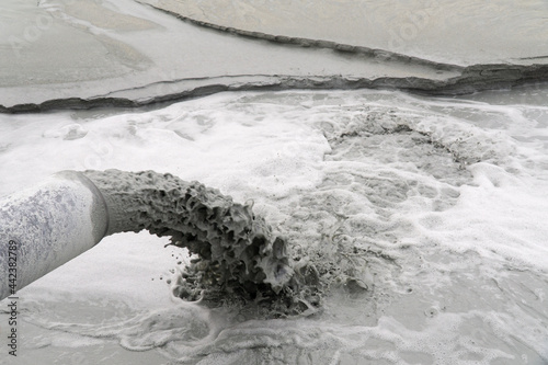 Foto discharge of fine sand into the tailing dump