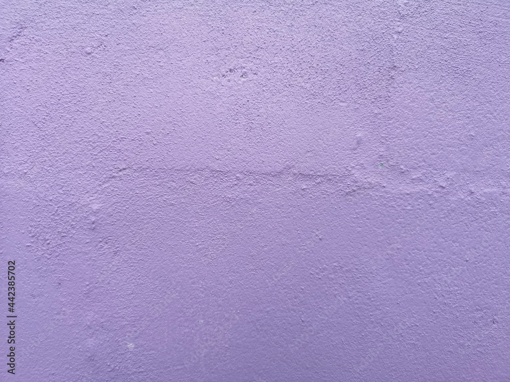 Violet color​ paint​ on Cement​ wall​ concrete textured background​ abstract​ material​ rough surface