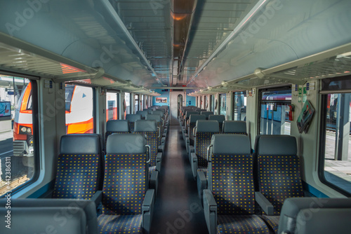 Schweiz passenger coach with color seats in Austria with fast train