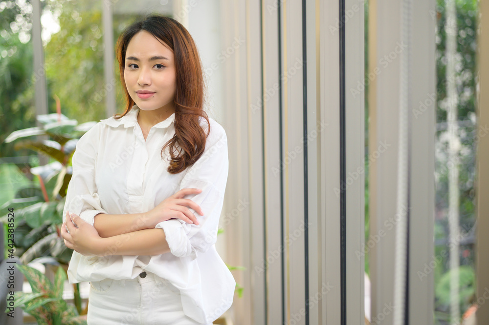 Portrait of confident business asian woman wearing  white shirt in office
