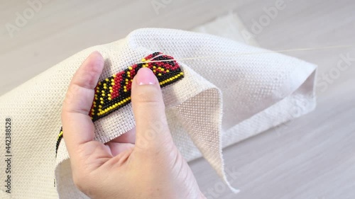 The process of beading close-up. women's hobby.
