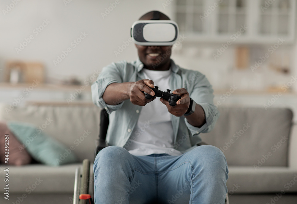 African american millennial man relax in living room interior, play video game, using gamepad African american millennial man relax in living room interior, play video game, using gamepad