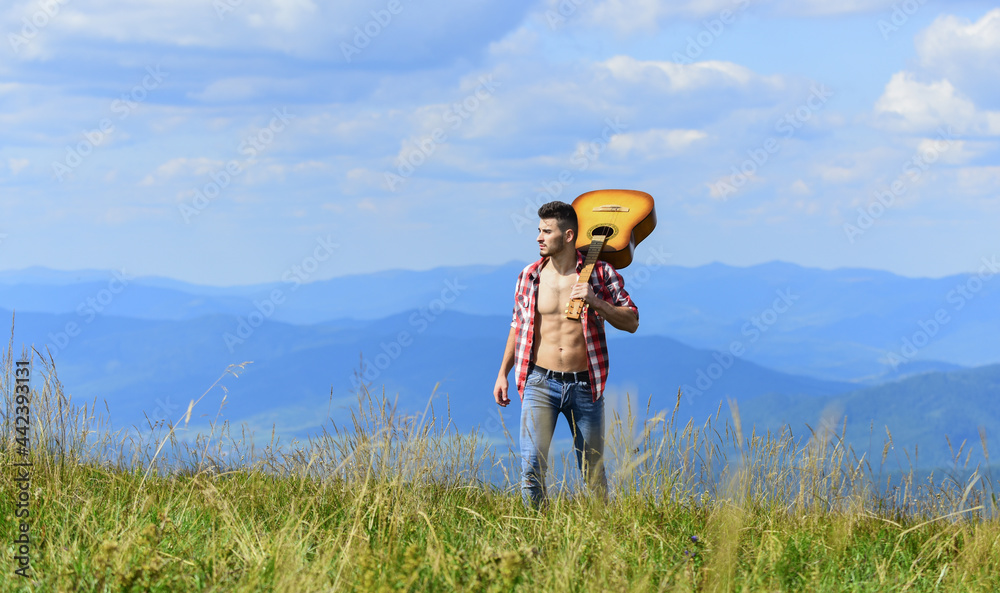 Walking alone. Man with guitar walking on top of mountain. Guy hiker enjoy pure nature. Exploring nature. Beauty of nature. Best way to escape from city. Fresh mountain air. Vacation destinations