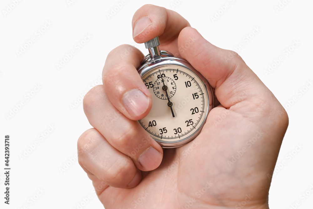 Stopwatch in hand, finger presses a button, start, finish, isolate, close-up Stopwatch in hand, finger presses a button, start, finish, isolate, close-up