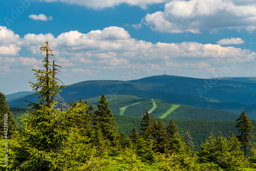 Ski slopes on Cervenohorske sedlo and Praded hill from Spaleny vrch hill summit in Jeseniky mountains in Czech republic photo