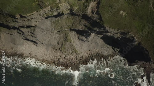 Aerial video view of the Luces lighthouse in Colunga, Asturias. Spain. photo