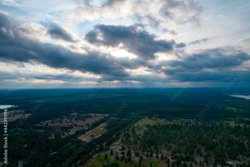 Aerial view of clouds over the valley at sunset