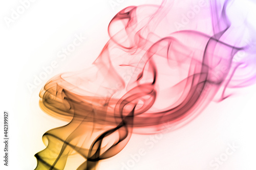 photo of smoke on a black background  post-processing in a graphic program  blur  color gradient filter. Negative.