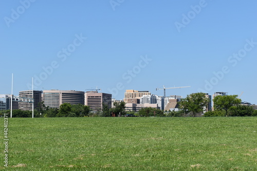 Arlington, VA, USA - June 28, 2021: Skyline of downtown Arlington, VA, as viewed from Gravelly Point Park. © JudithAnne