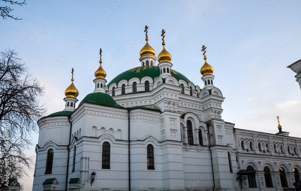 Fototapeta premium Gilded domes of the medieval Refectory Church of the Saints Anthony and Theodosius in Kyiv Pechersk Lavra, Ukraine. 