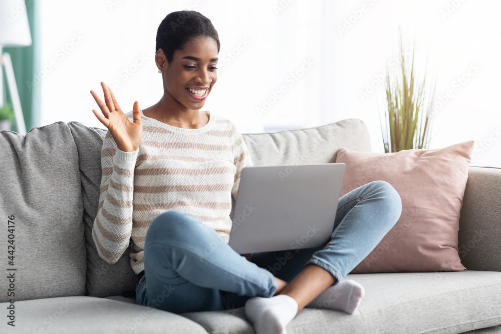 Online Communication. Cheerful Black Woman Using Laptop For Video Call At Home Online Communication. Cheerful Black Woman Using Laptop For Video Call At Home