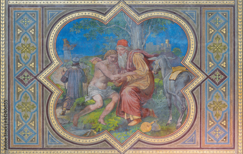 VIENNA, AUSTIRA - JUNI 24, 2021: The fresco good Samaritain in the Votivkirche church by brothers Carl and Franz Jobst (sc. half of 19. cent.).
