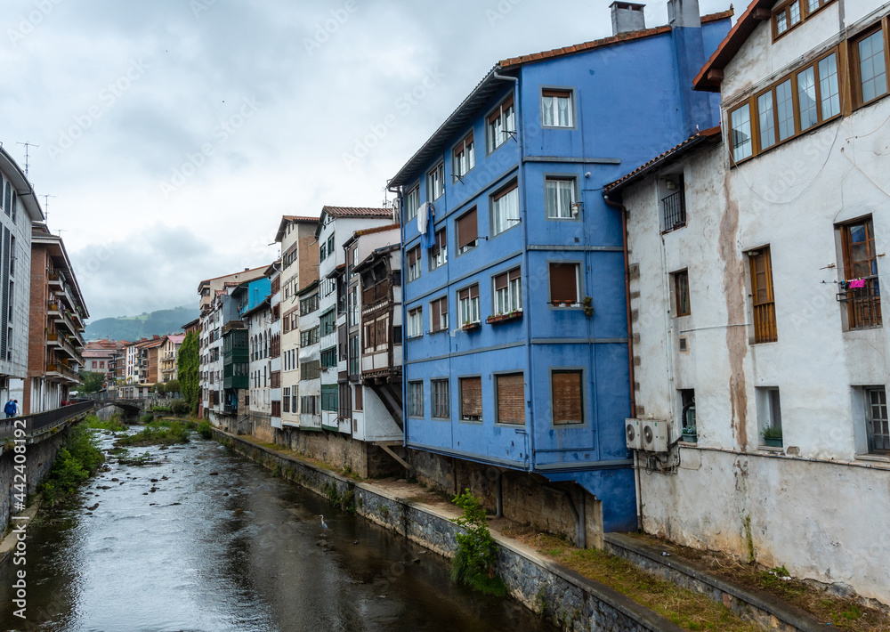 Traditional blue house in the town of Azkoitia next to the Urola river, Gipuzkoa. Basque Country