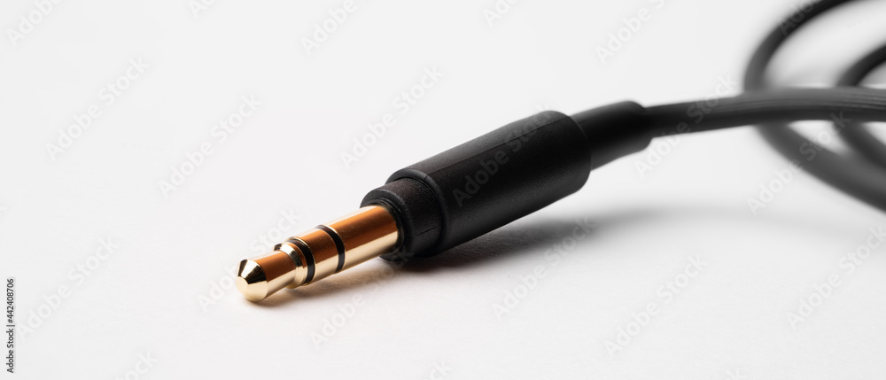 Headphone connector, audio cable on white background - obrazy, fototapety, plakaty 