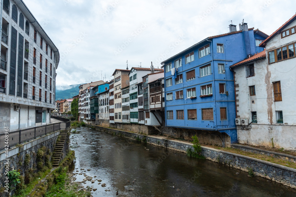 Traditional blue house in the town of Azkoitia next to the Urola river, Gipuzkoa. Basque Country