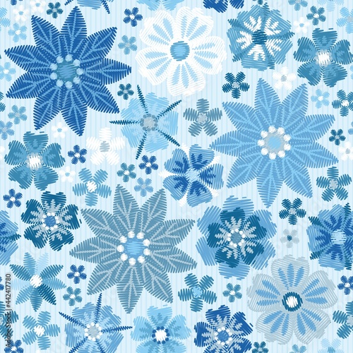 Floral embroidery seamless pattern with blue flowers - snowflakes. Beautiful print for fabric.