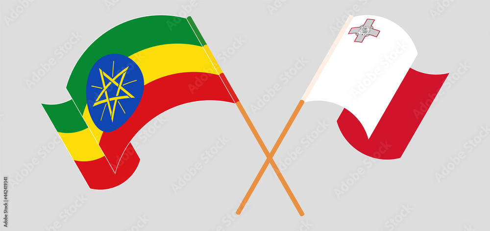 Crossed and waving flags of Ethiopia and Malta Crossed and waving flags of Ethiopia and Malta