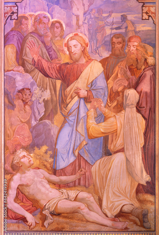 VIENNA, AUSTIRA - JUNI 24, 2021: The fresco Jesus exorcising a boy possessed by a demon in the Votivkirche church by brothers Carl and Franz Jobst (sc. half of 19. cent.).
