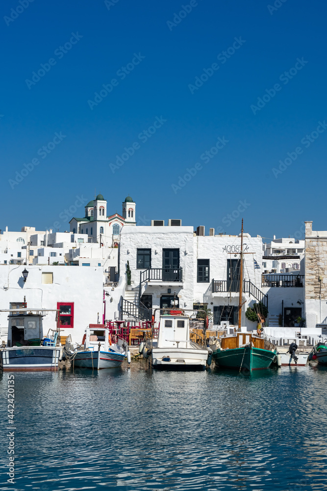Pictoresque whitewashed port of Naoussa, Paros island, Cyclades Archipelago, Greece