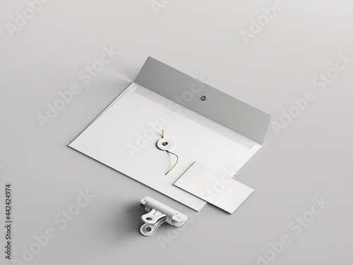 3d rendered business card, paper clip and c5 envelope blank mockup template with a perspective view (ID: 442424974)