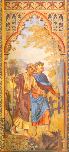 VIENNA, AUSTIRA - JUNI 24, 2021: The fresco of the parbale about two blinds in the Votivkirche church by brothers Carl and Franz Jobst (sc. half of 19. cent.).
