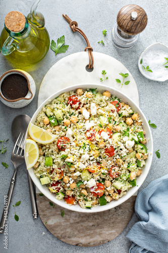 Obraz na plátně Healthy low carb salad with cauliflower rice and chickpeas